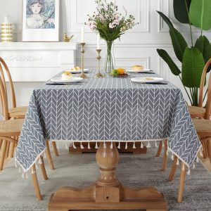 Antique-style tassel table cover with neutral decor
