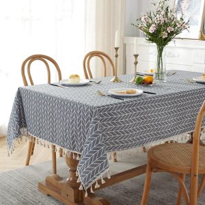 Minimalist Scandinavian table setting with cotton linen tablecloth