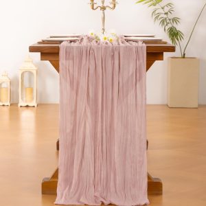 Vibrant hot pink table runner with matte finish on banquet table