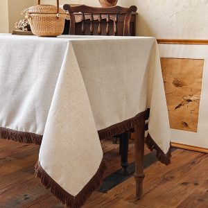 Natural beige tablecloth with farmhouse style decor