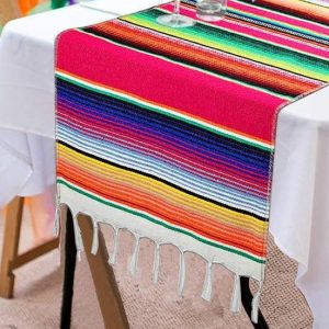 Festive Mexican runner table for outdoor party or dining event