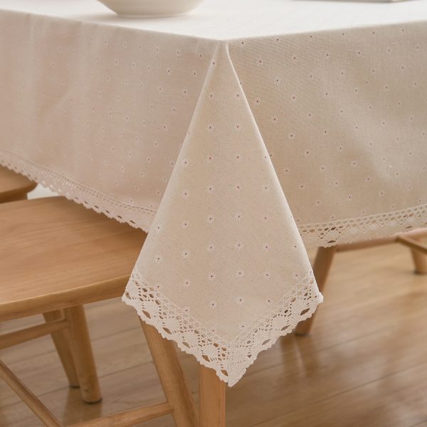 Soft cotton linen fabric with textured weave and delicate floral pattern for vintage tablecloth