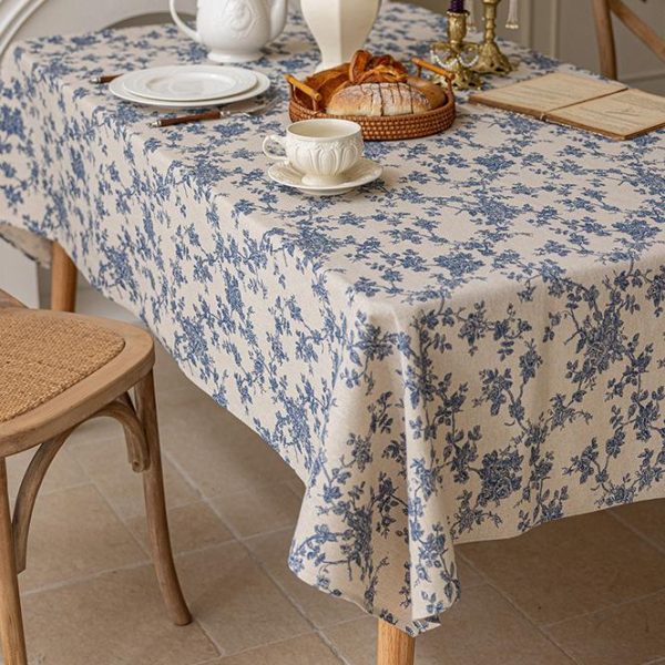 Elegant vintage tablecloth in a sunlit kitchen dining setup