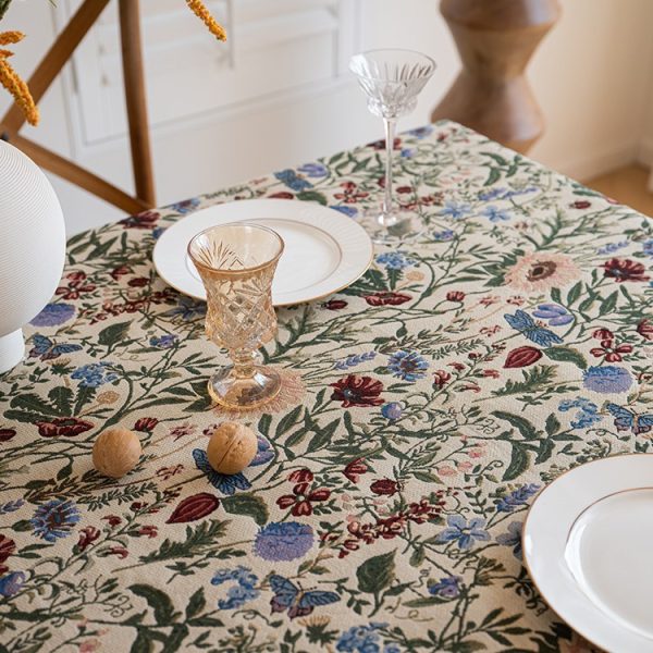 Vintage-inspired tablecloth with fringe details on rectangular table – washable and eco-friendly